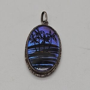 dichroic blue purple pendant with palm tree imagery made in Brazil